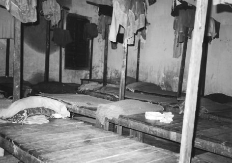Sheebani's sleeping quarters with hard, wooden-slatted beds