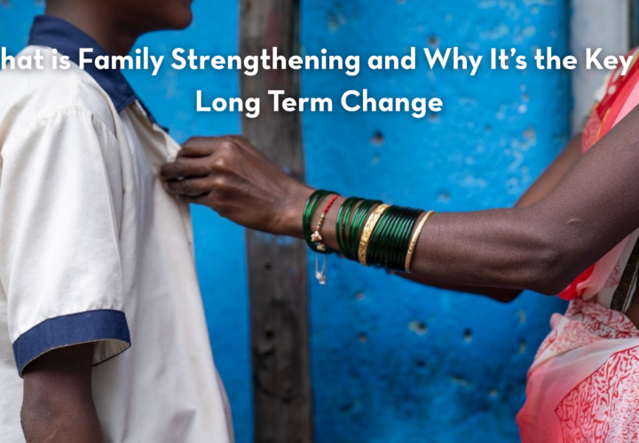 Mom helping son with tie