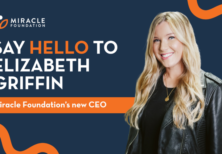 Elizabeth Griffin, Miracle Foundation’s new Chief Executive Officer, smiles against a navy background beside the Miracle Foundation logo and the text “Say Hello to Elizabeth Griffin, Miracle Foundation’s new CEO.